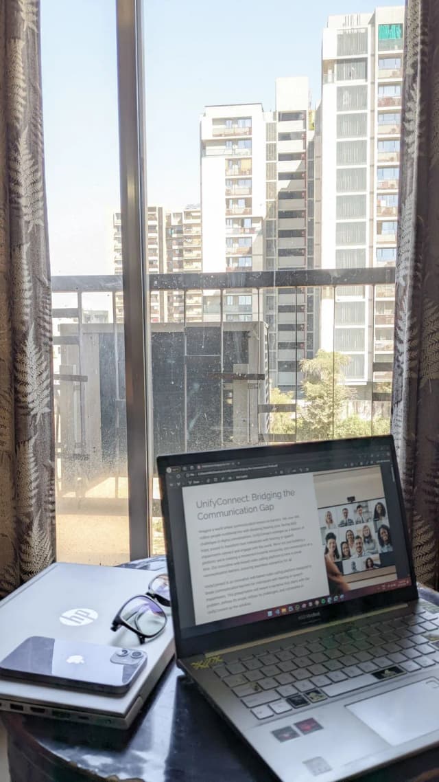 A working setup at a window looking over the city