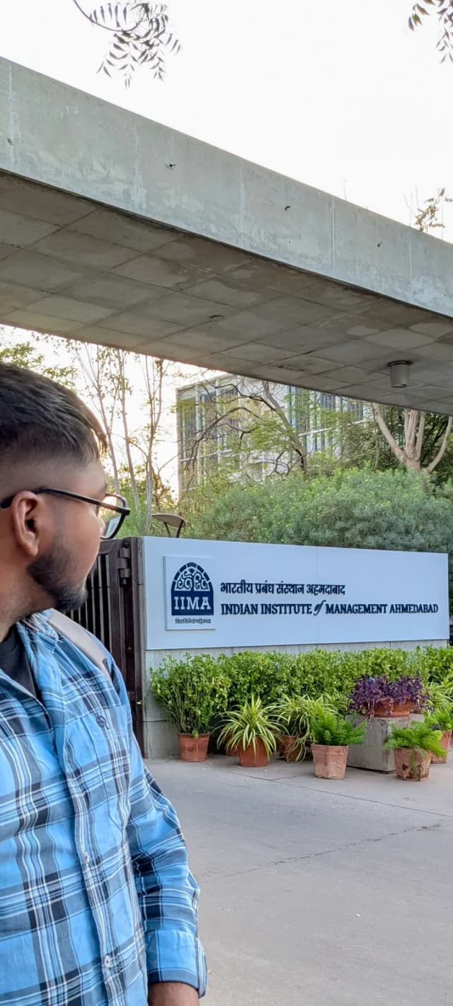 At the gates of IIM Ahmedabad