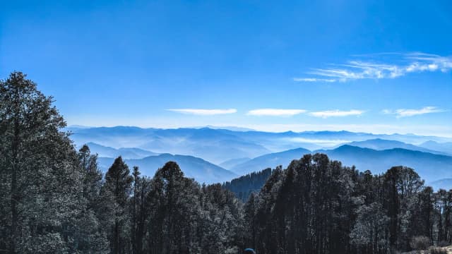Ridges of the Himalayas fading into haze